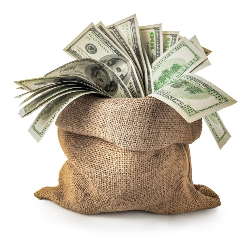 stack of money in a burlap bag
